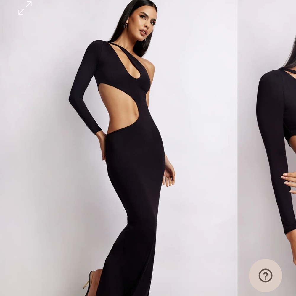 Black cut out black form fitting dress.